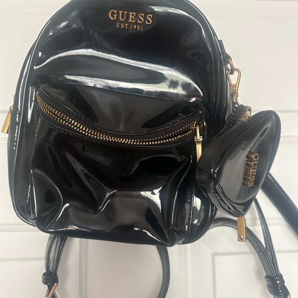 GUESS Shiny Black Backpack with Gold Details